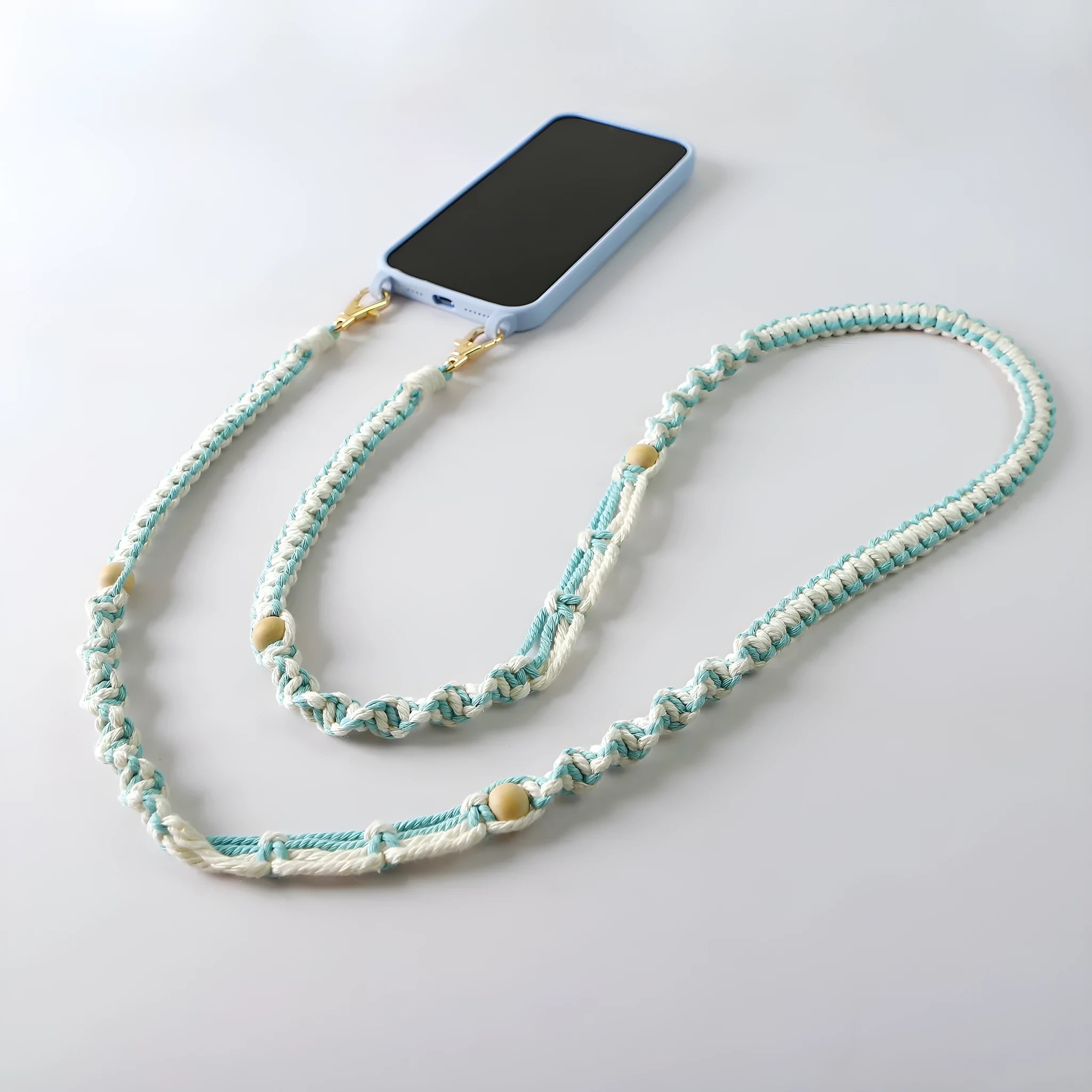 Hand-woven cotton mobile phone charm crossbody strap with alloy connectors in bohemian vintage pastoral style, available in multiple colours.