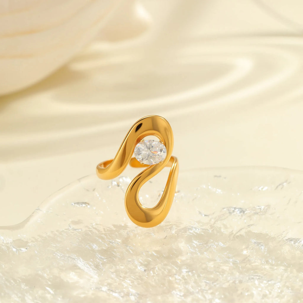 Adjustable geometric zircon ring in stainless steel with electroplated finish showing open-mouth design