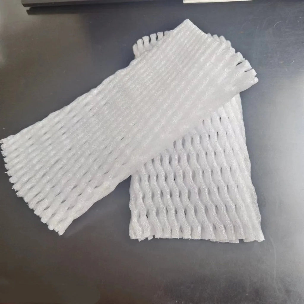 White foam net protective cover for fruit, shown next to an apple, with size options listed.