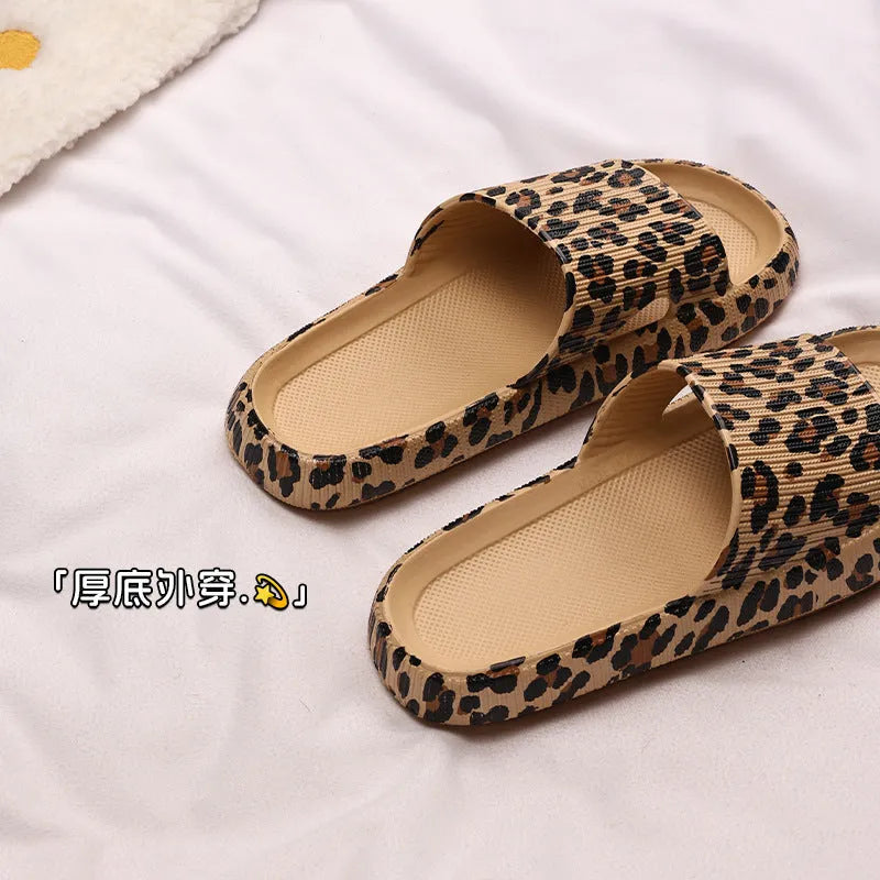Women's leopard print EVA slippers with thick sole in black, pink, white zebra and khaki animal print colours