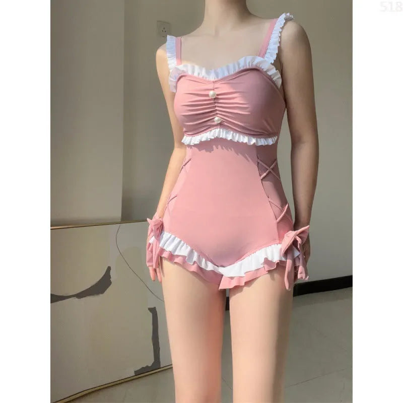 Women's one-piece sun protection swimsuit in milk silk fabric, solid colour pink, sleeveless design