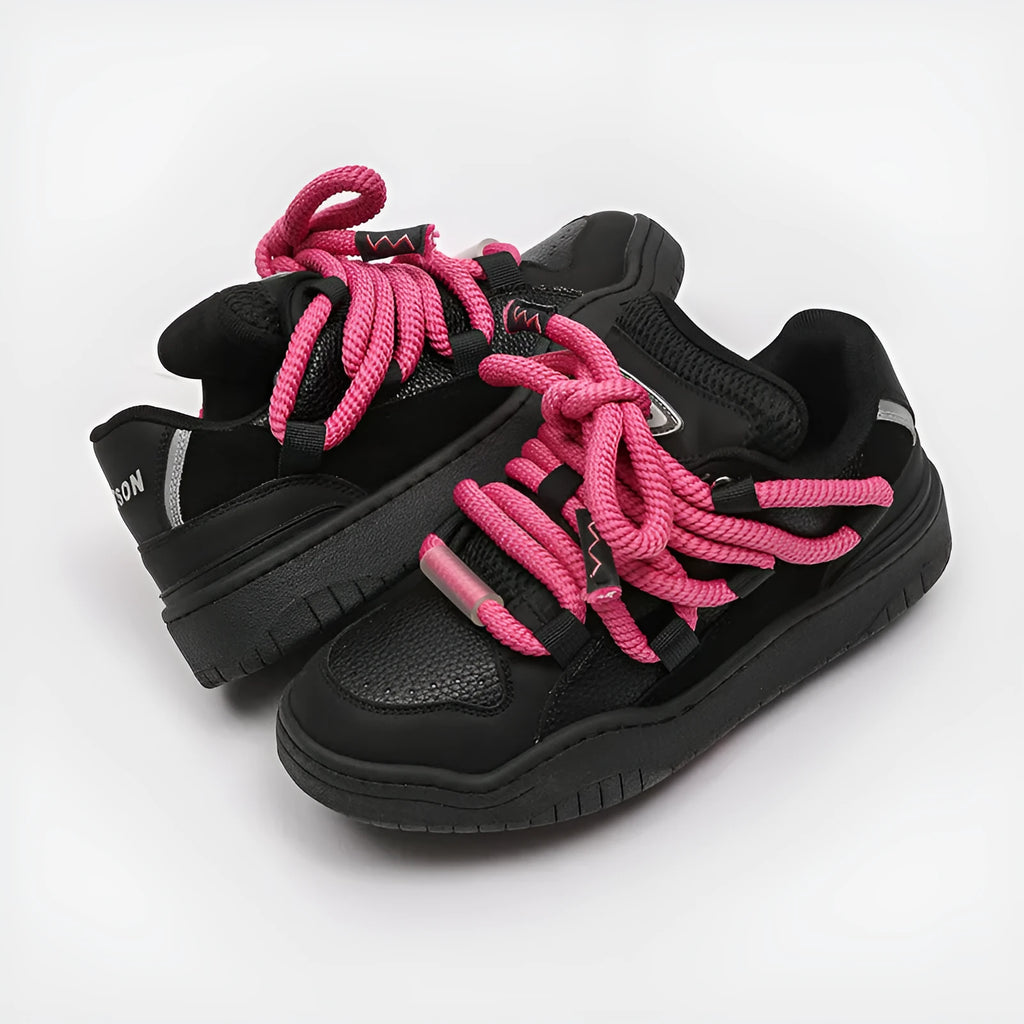 A pair of solid-colour casual lace-up shoes with a thick rubber sole and round toe