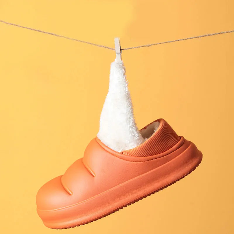 Women's waterproof EVA winter house slippers in multiple colours with plush lining and non-slip sole.