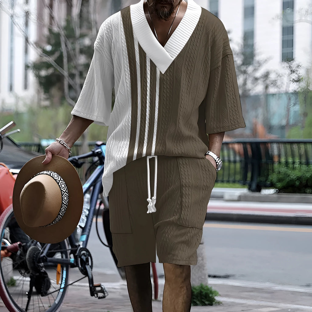 Men's printed drop-shoulder knitted short-sleeve top and matching shorts set on a hanger.