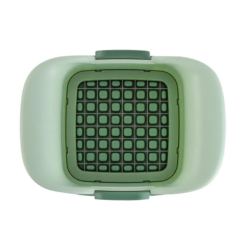 Green multifunctional vegetable chopper with hand pressure mechanism for cutting onions, potatoes, and cucumbers