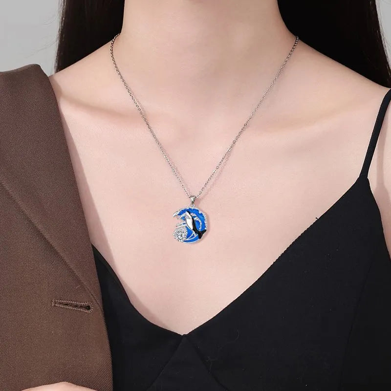 Shark pendant necklace for women on a cross chain, electroplated copper, adjustable length.