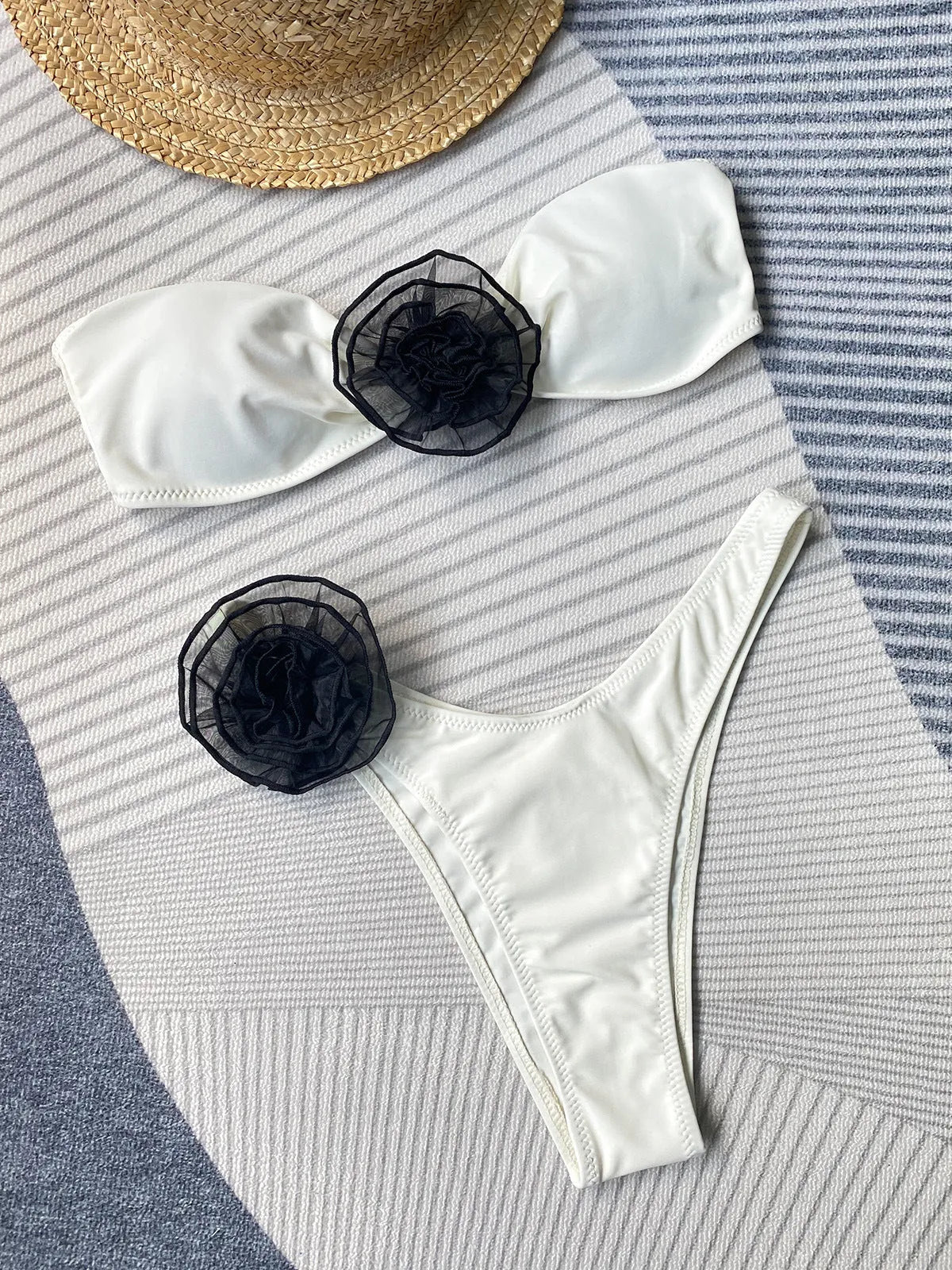 Bikini swimsuit set with tube top and shorts featuring three-dimensional flower split design