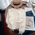 Cashmere blend slim fit cardigan sweater coat with beaded decoration on a hanger.