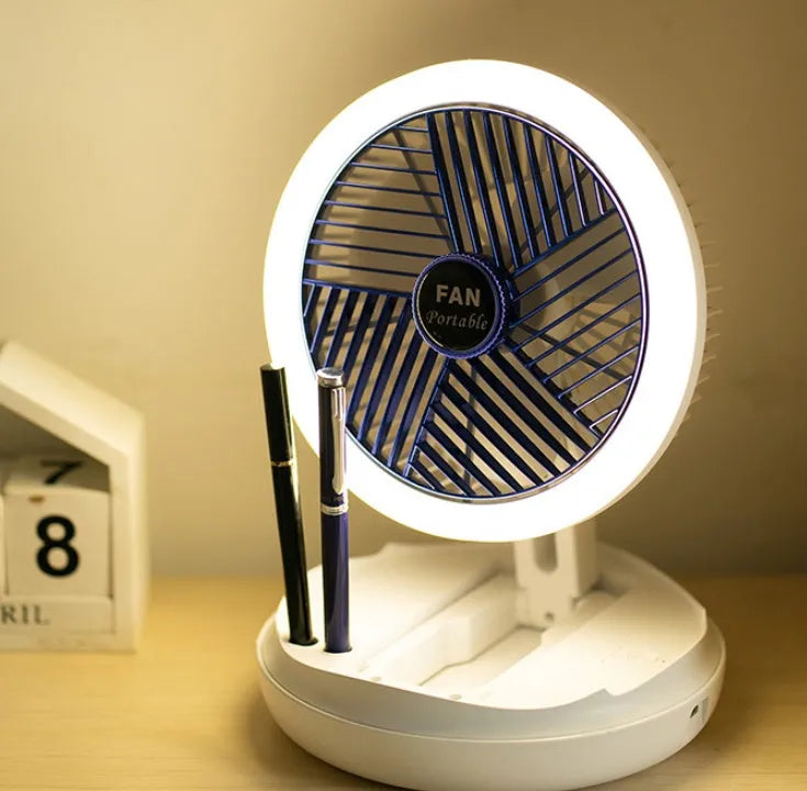 USB charging foldable table fan with LED light in blue, showing 4 speed settings and 300° rotation for home cooling