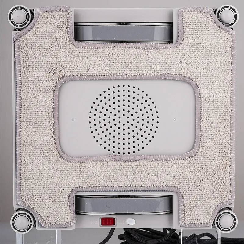 White intelligent window cleaning robot for high-rise buildings with electric motor