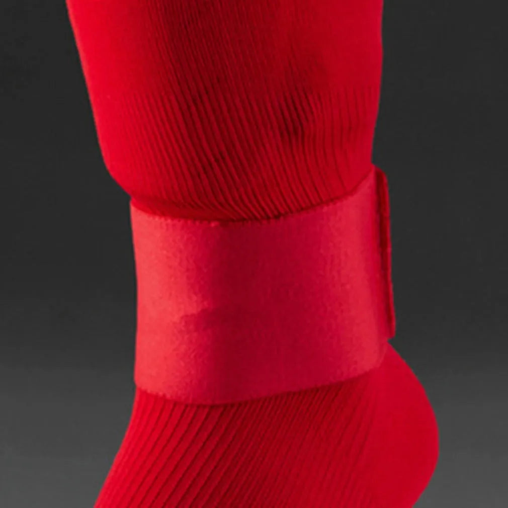 Elastic rubber football shin guard fixing tape belt in red, blue, black or white colours measuring 25cm by 6.5cm