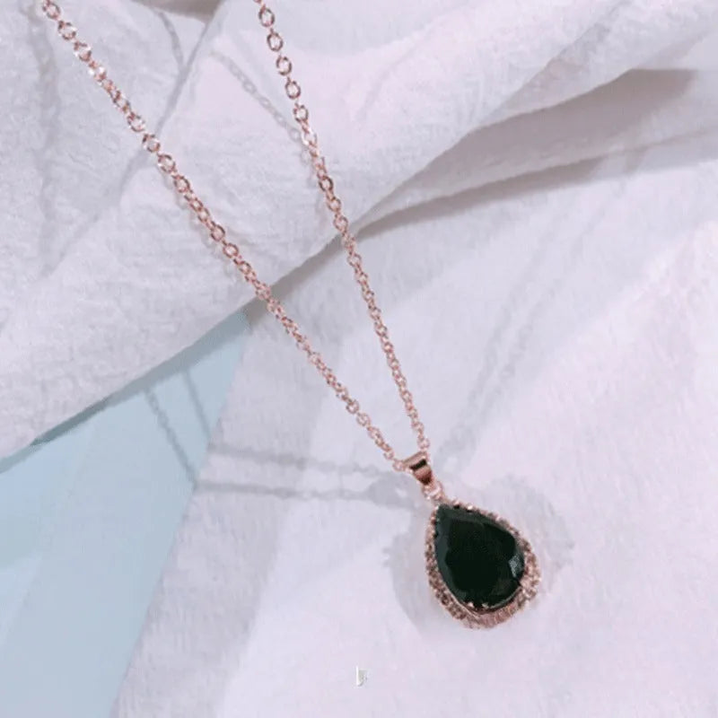 Drop-shape alloy necklace with rhinestone inlay available in eight electroplated colour finishes