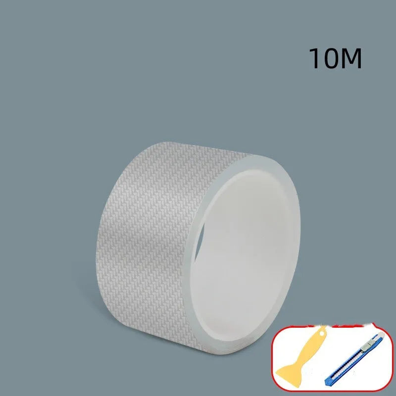 Roll of clear carbon fibre anti-collision film with scraper and utility knife for car door edges