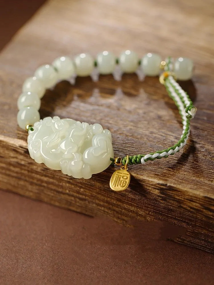 Year of Rabbit Hetian jade bunny bracelet with S925 silver blessing card on red ice cotton rope