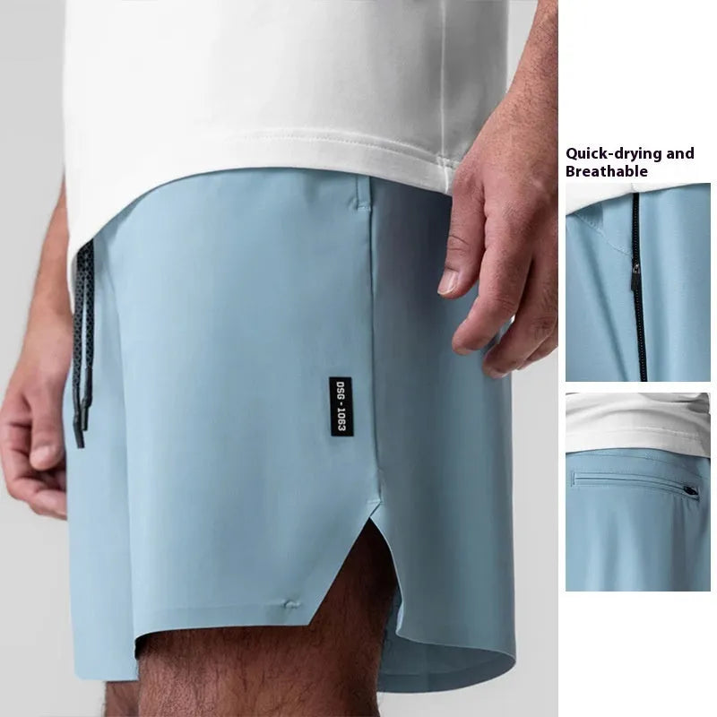 Men's quick-drying polyester sports shorts in knee length with multi-bag design, black colour, front view