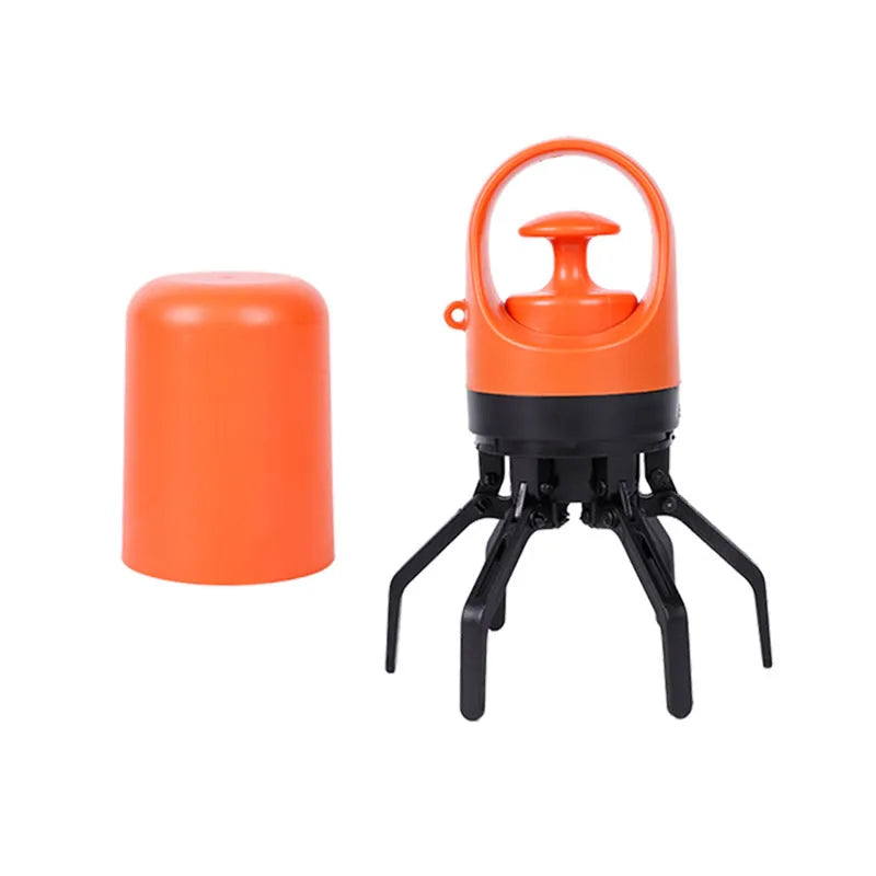 Blue dog pooper scooper with claw mechanism and bag dispenser on grass
