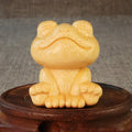 Solid bamboo smiling frog cartoon ornament measuring 5cm tall.