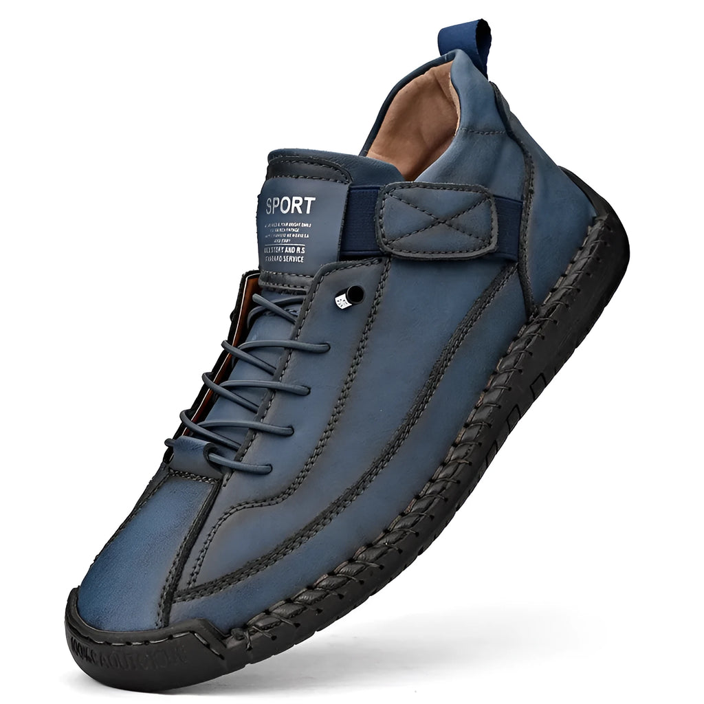 Men's mid-calf Martin boots in khaki with tooling stitching and an elastic band closure.