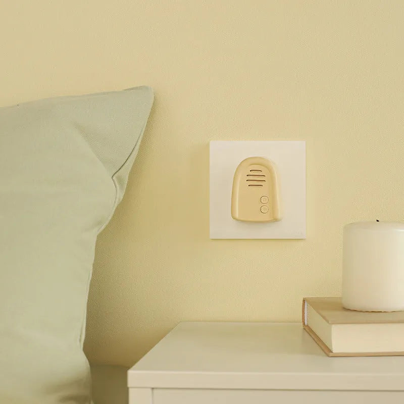 Wireless self-generating beeper doorbell in milky yellow or white colour with plug-in power
