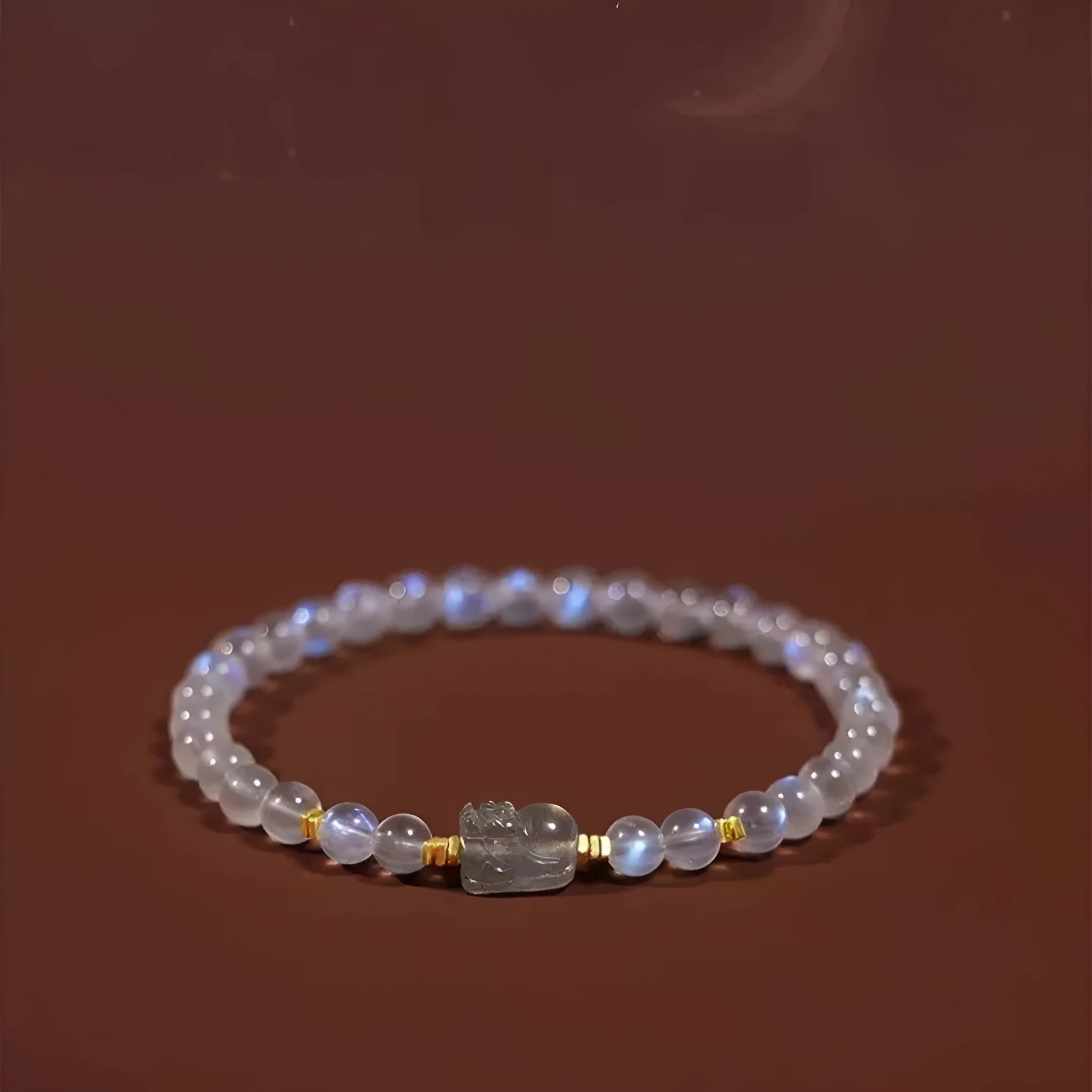 Moonstone women's bracelet with blue light effect and national-style animal motif design