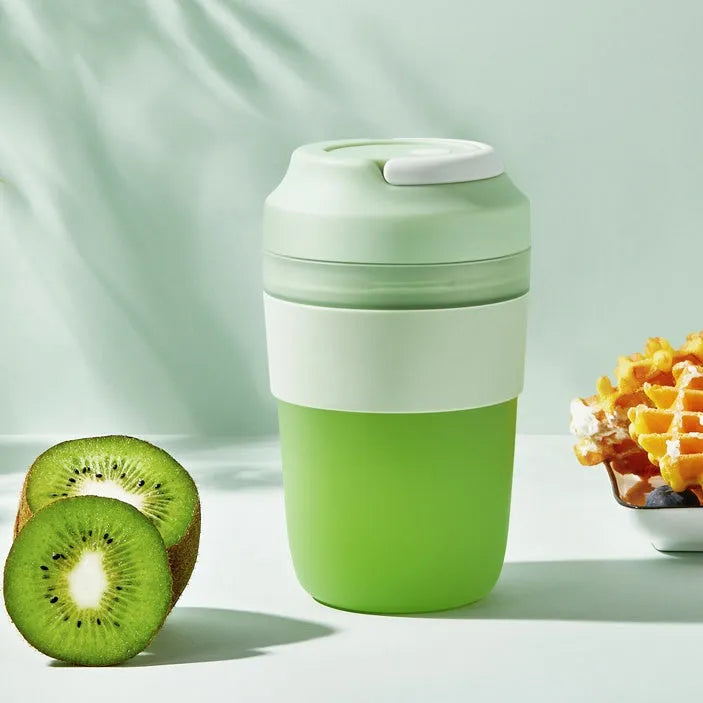 Portable rechargeable blender juicer cup 400ml with four stainless steel blades in avocado green