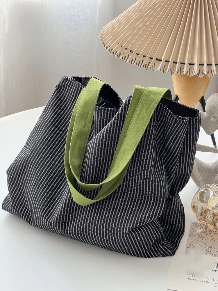 Canvas tote shoulder bag in black gray plaid with multi-layer compartments and lining cloth