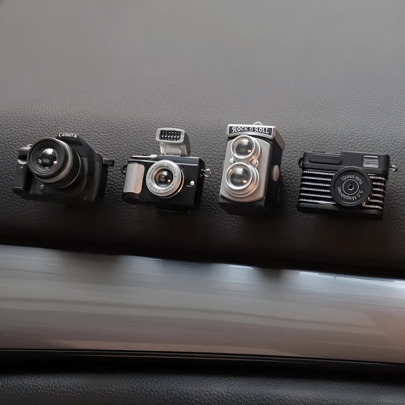 Retro camera dot shaped small plastic paste hook for car interior, 4.2x2.5cm.