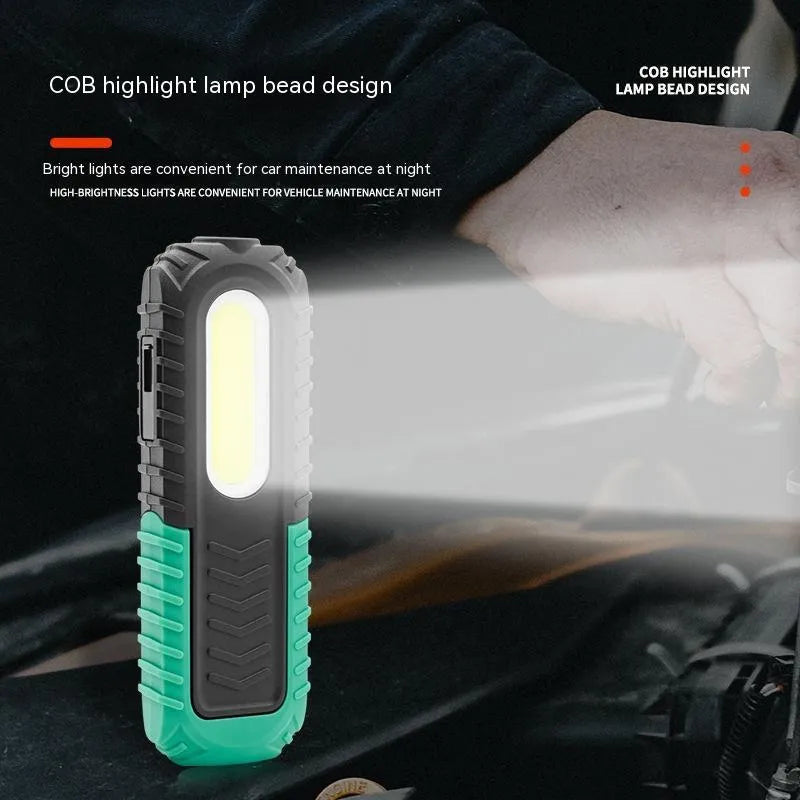Black and green USB rechargeable auto repair work light with drop-resistant housing