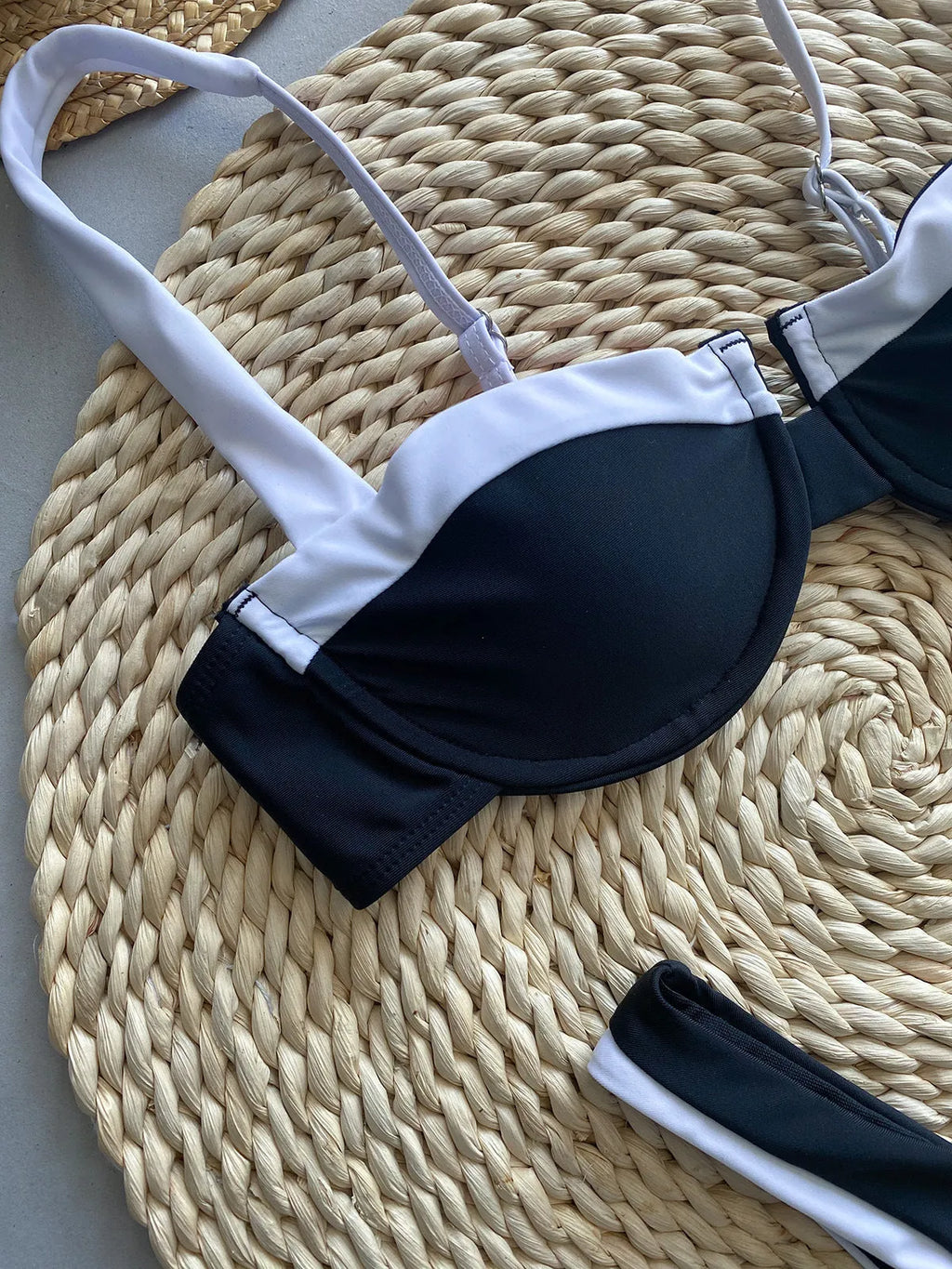 Black women's bikini set with stitching detail, nylon fabric, brief style, sizes S M L