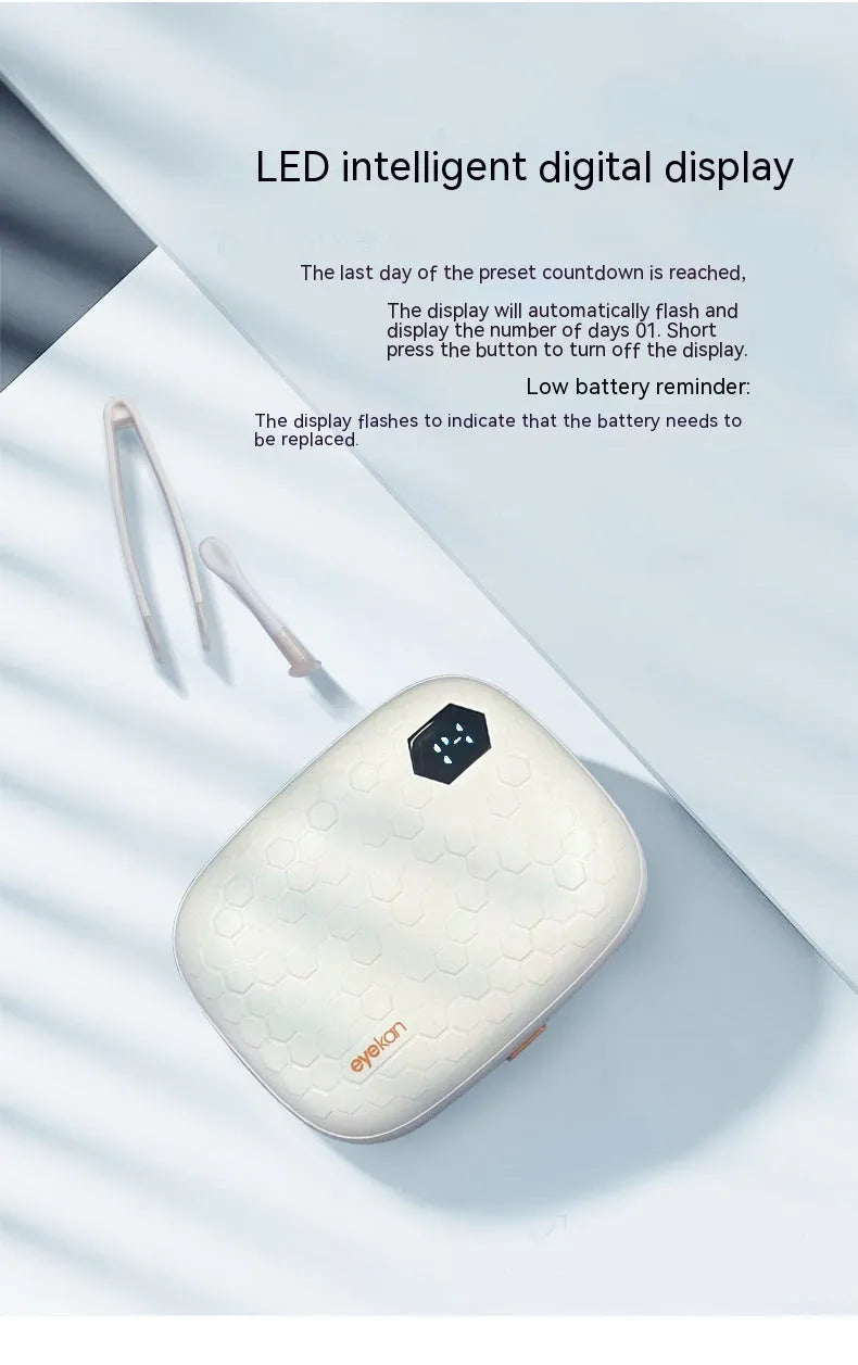 Automatic ultrasonic contact lens cleaning machine in pearl white, blue, or pink plastic housing.