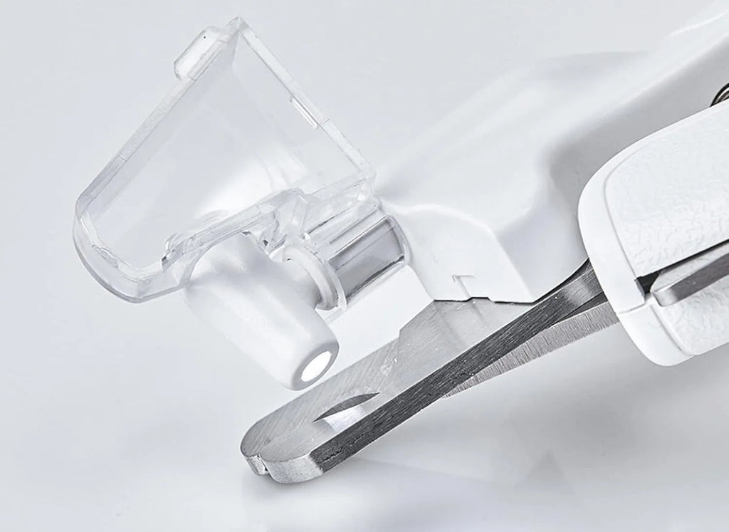 White pet nail clippers with LED light, transparent anti-splash guard, and a leather-like handle.
