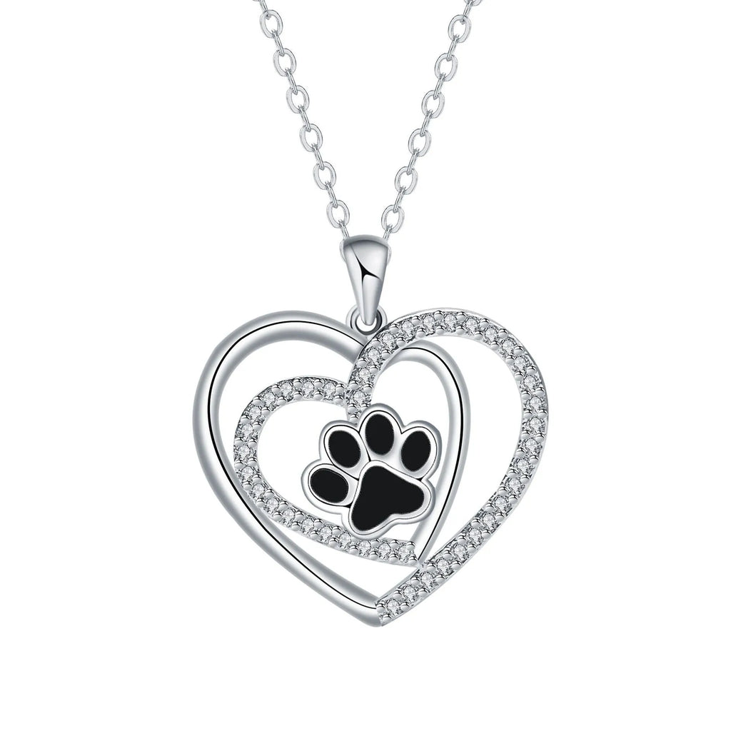 Women's silver-tone necklace with dog paw footprint pendant on cross chain