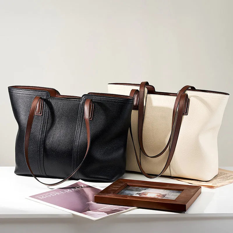 Genuine leather women's crossbody commuter bag in black with internal organisation compartments