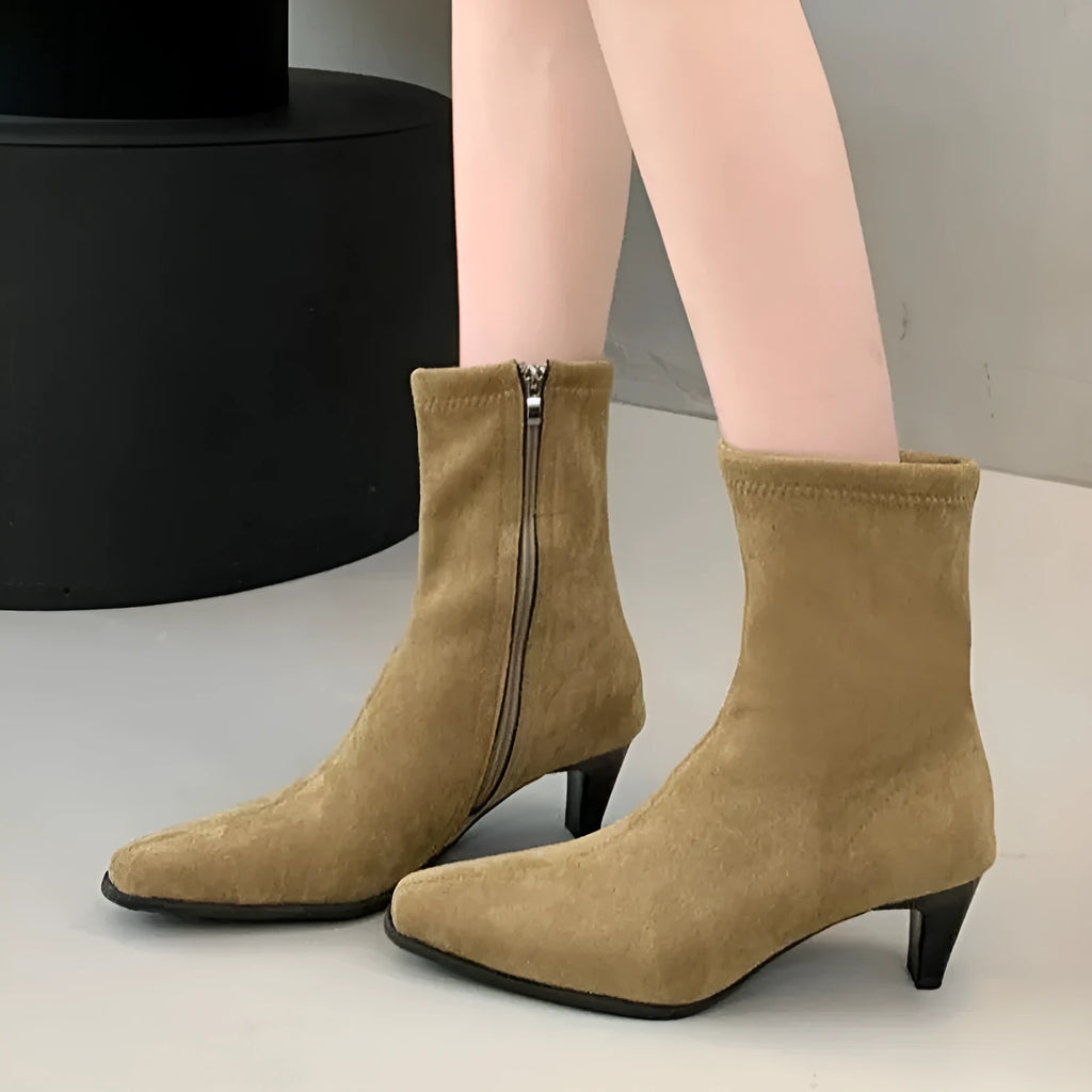 Brown women's square toe mid-calf boots with a side zipper and a low kitten heel on a waterproof platform sole.