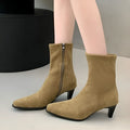 Brown women's square toe mid-calf boots with a side zipper and a low kitten heel on a waterproof platform sole.