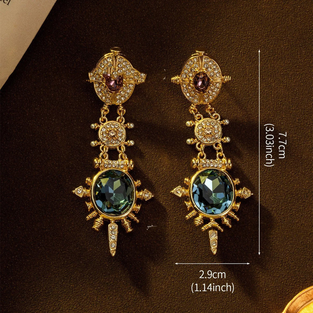 Gold retro geometric stud earrings with round design elements and diamond treatment