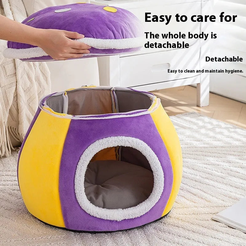 Grey mushroom-shaped plush cat bed with raised sides, showing a cosy nest for a cat.