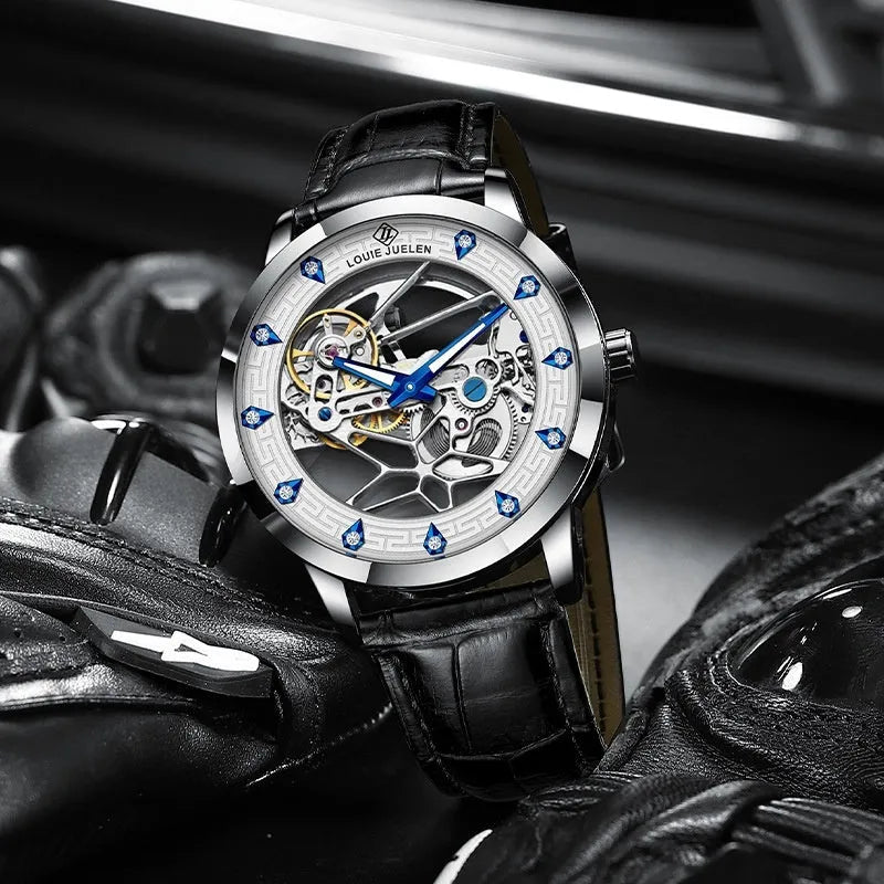Men's silver mechanical watch with white dial, blue hands, and brown leather strap