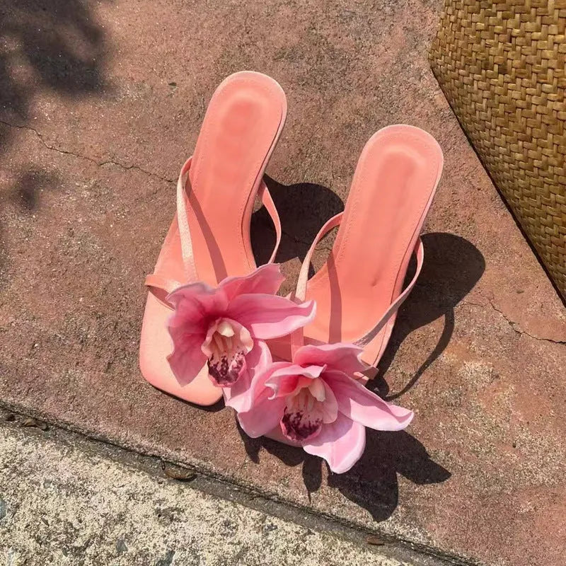 Pink satin square toe women's sandals with artificial phalaenopsis flower and mid heel