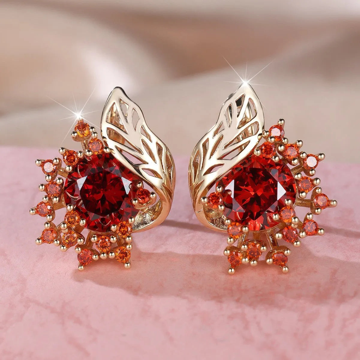 Round flower feather earrings with zircon stones in champagne gold finish, showing six colour variations