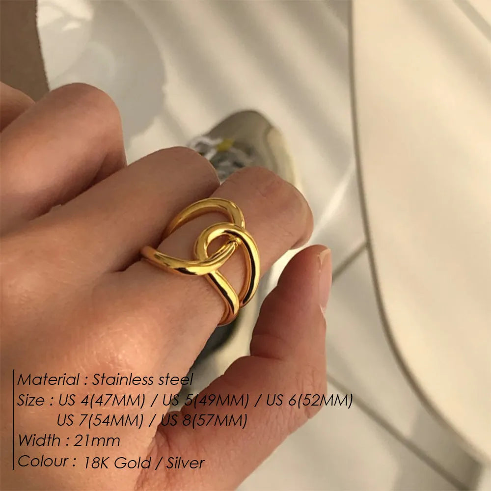 Women's stainless steel adjustable opening ring with knot design in gold or steel colour