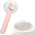 Blue self-cleaning cat brush with a rubber handle and a one-click button for hair removal.
