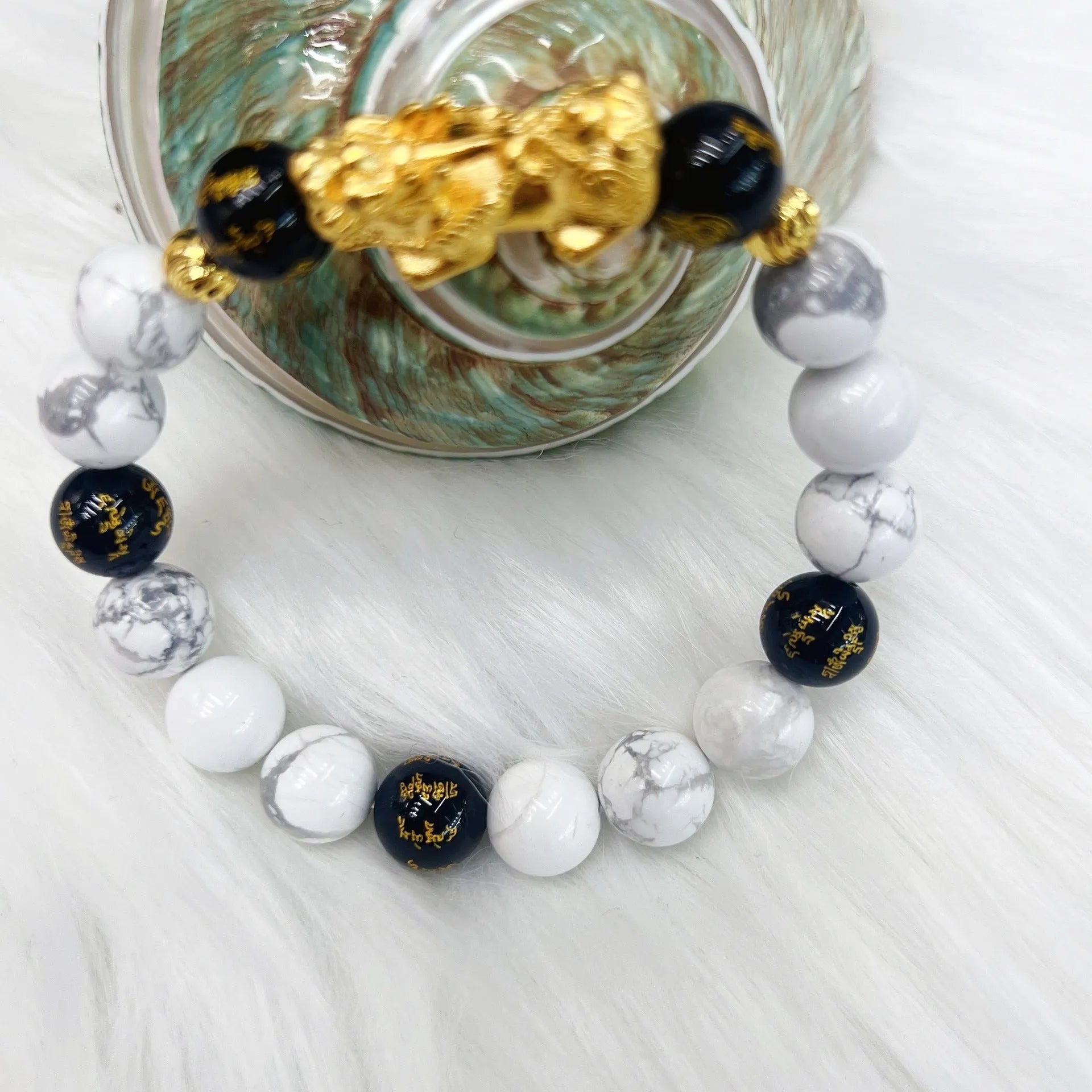 Vintage white turquoise and black agate bracelet on a neutral background, adjustable length 15-17cm