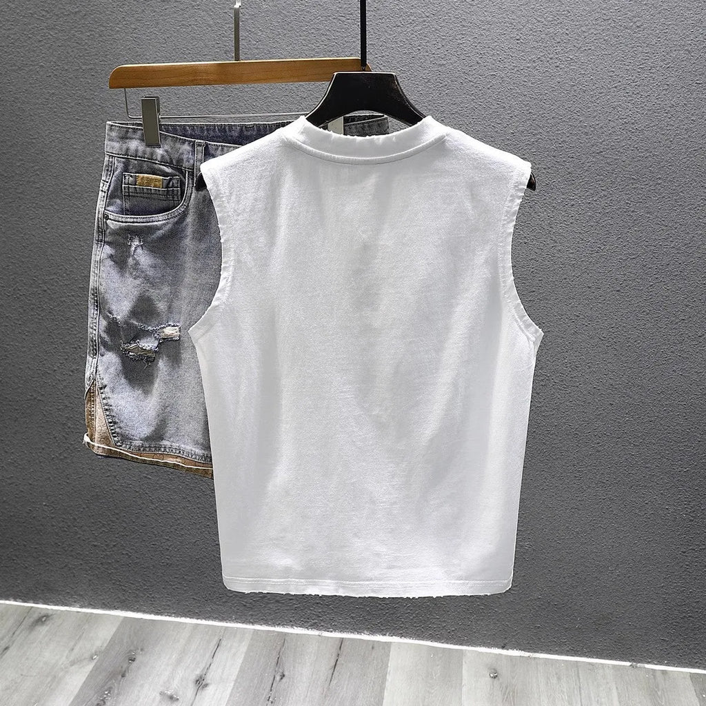 Solid colour cotton sleeveless t-shirt in loose fit with straight hem design