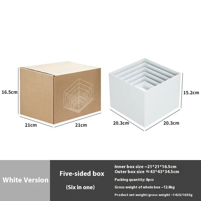 White plastic modular dessert display stand with six interlocking cube pieces arranged in a tiered configuration.