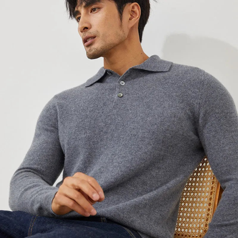 Man wearing a sapphire blue loose-fit cashmere polo neck pullover sweater