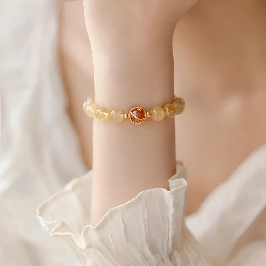 Natural gold rutilated quartz crystal bracelet with diamond cut beads, 6mm and 8mm sizes, unisex design