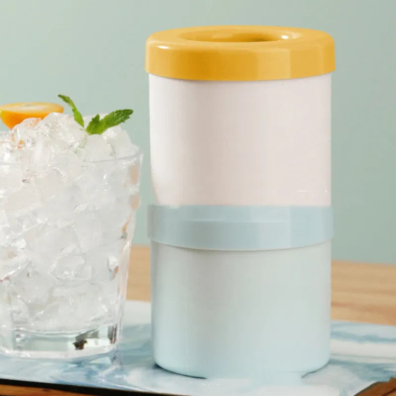 Portable 2-in-1 silicone ice bucket mold with lid in blue-green on a white background