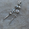 Hesheng antique silver geometric XINGX pendant earrings with rhinestone detailing and long drop design