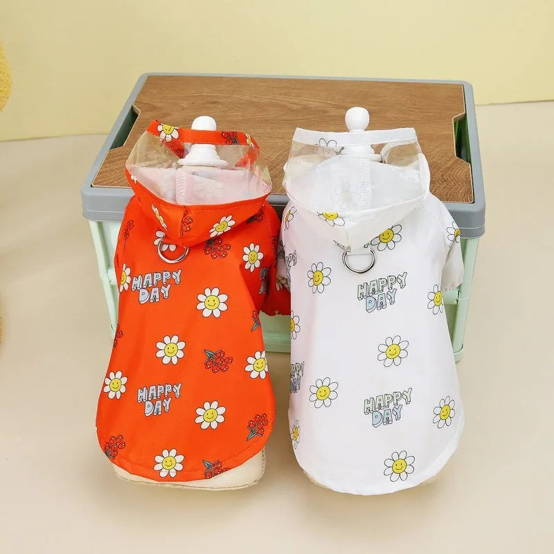 Transparent dog raincoat in orange with pull ring traction on a white background